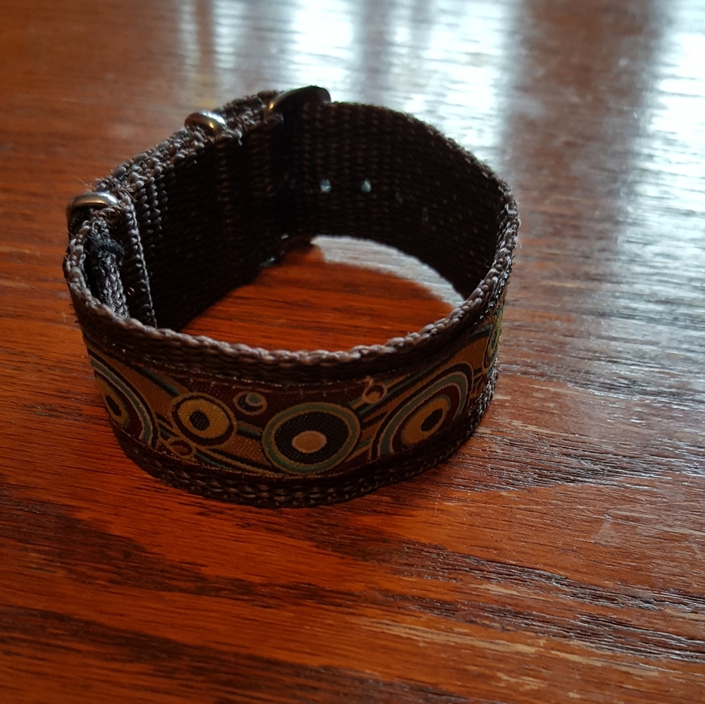 Artisan-made watchband.